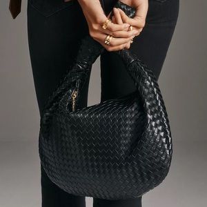 Anthropologie black purse - barely used and don’t need anymore
